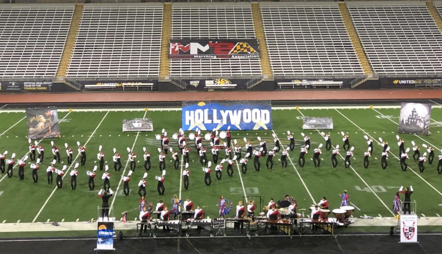 The Lancer Marching Band performs their show at Towson University. They are pictured executing one move from their visual choreography.