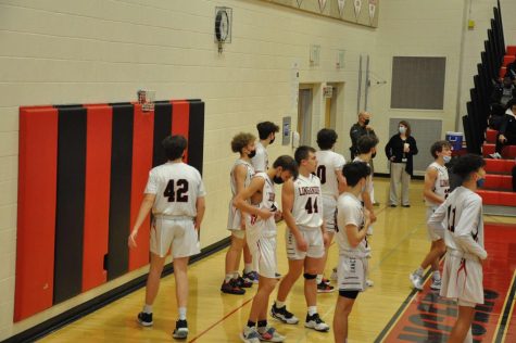 JV Boys basketball warms up against Urbana.