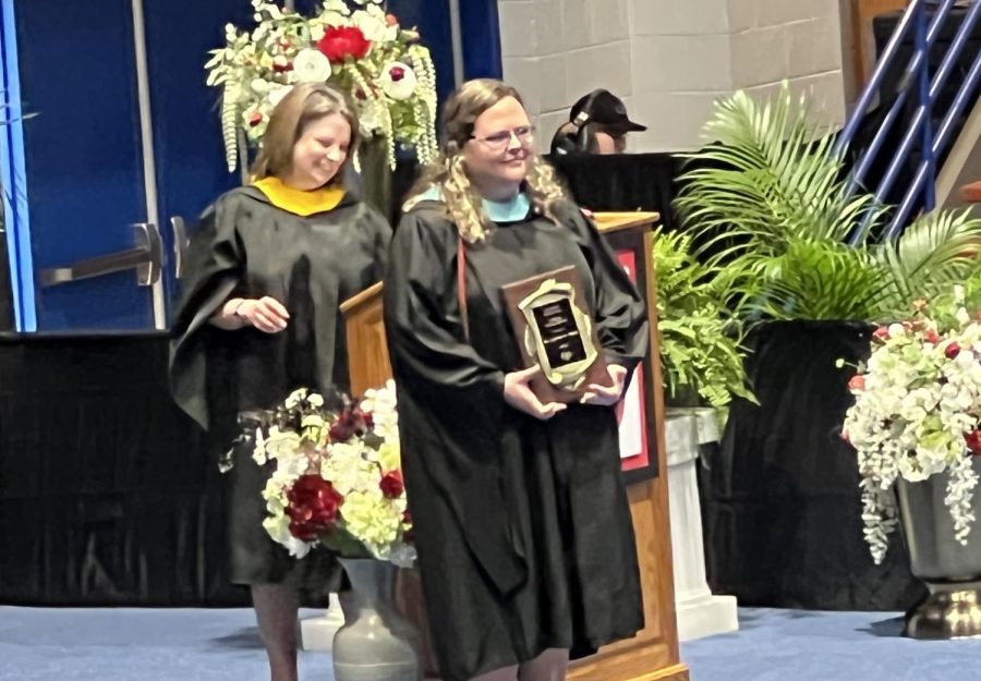 Science teacher Jessica Baker wins the Golden Lance Award at graduation.