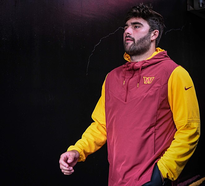 Quarterback Sam Howell walks out of the tunnel before a game. (All-Pro Reels / Joe Glorioso)