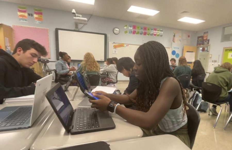 Josslyn Quansah on her phone during first period Algebra 2 Honors with Ms. Klein.