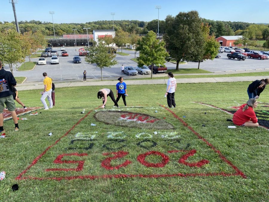 The sophomore class adds a football and their class year onto their spot on the hill to tie in with the theme.