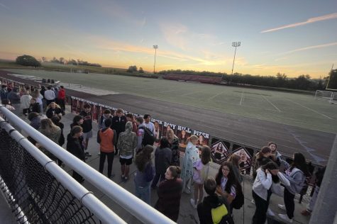Seniors gather to watch the sunrise at the 2nd annual Senior Sunrise event.