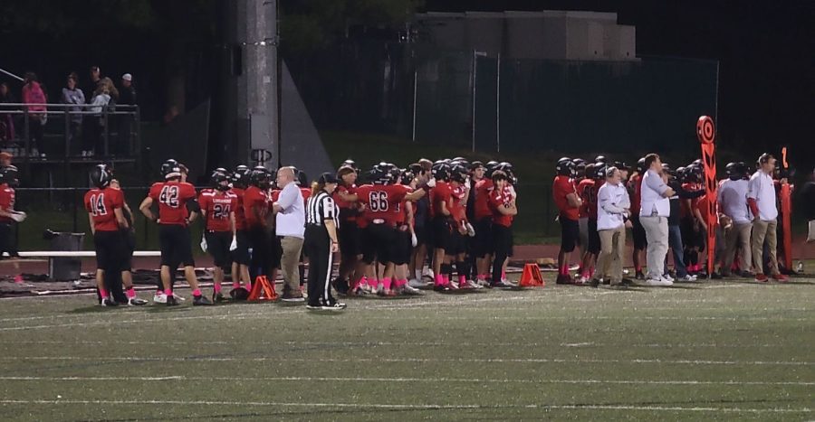 The Linganore varsity football team prepares for their Homecoming game against Tuscarora.