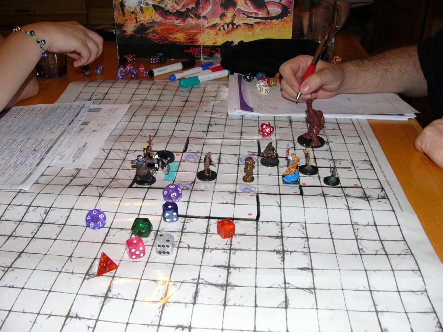 Dungeons+and+Dragons+consists+of+fantasy+and+role-playing+that+has+recently+been+enhanced+in+popularity.+