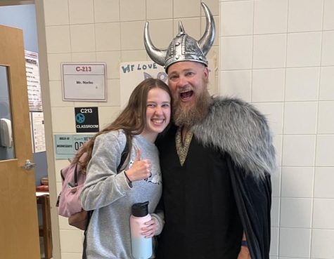 Cara Morgan(10) and her Viking dad Patrick Morgan show of their Halloween spirit.