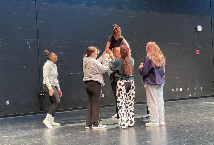 Dance students try out ideas as they construct choreography for their February 9 performance. (Photographed from left to right: Mckinley Howard, Melissa Bowman, Regan Helm, Lily Godette, Molly Granger, Aubrey Heister, Cara Morgan.)