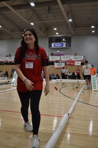Emily Cohen smiles after throwing a great shot against CH Flower High School in the unified bocce ball teams last match.