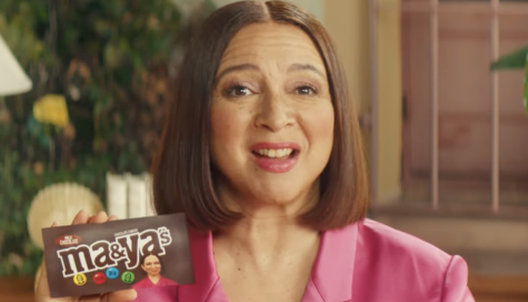 Newly-hired spokesperson Maya Rudolph proudly displays the new Ma&Yas candy packaging.