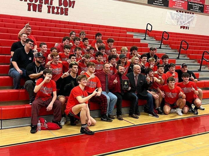 The Linganore wrestling team, now 3A regional champions, pose for a photograph together during the tournament.