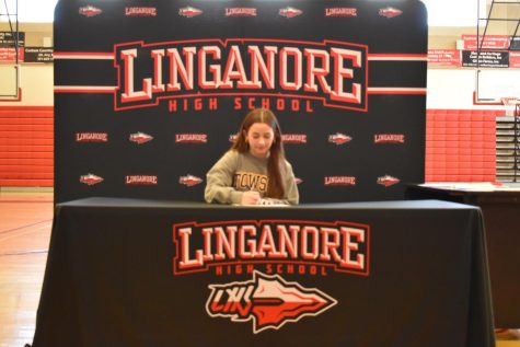 Molly Granger signs her National Letter of Intent to be apart of the Towson University poms team. 