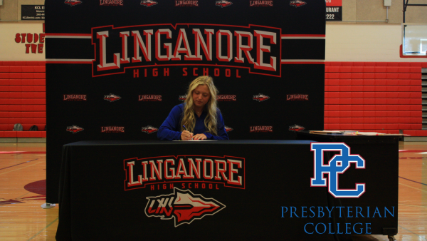 Annabel Geisler signs her National Letter of Intent to play lacrosse at Presbyterian College next fall.