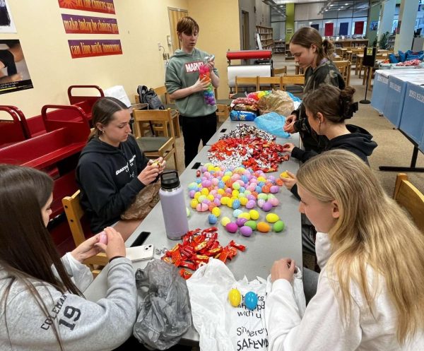 Linganore students work hard to fill the eggs with candy for the dozens of deliveries. (Photo by Ava Ablondi with permission)