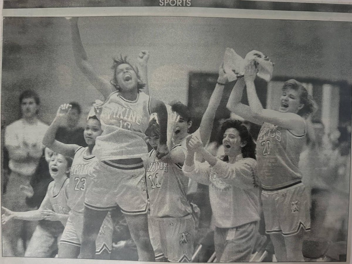 Tammy Webster and members of the Mount Hebron girls basketball team circa 1990 celebrate by jumping into the air (photo courtesy of Erica Farley, used with permission).