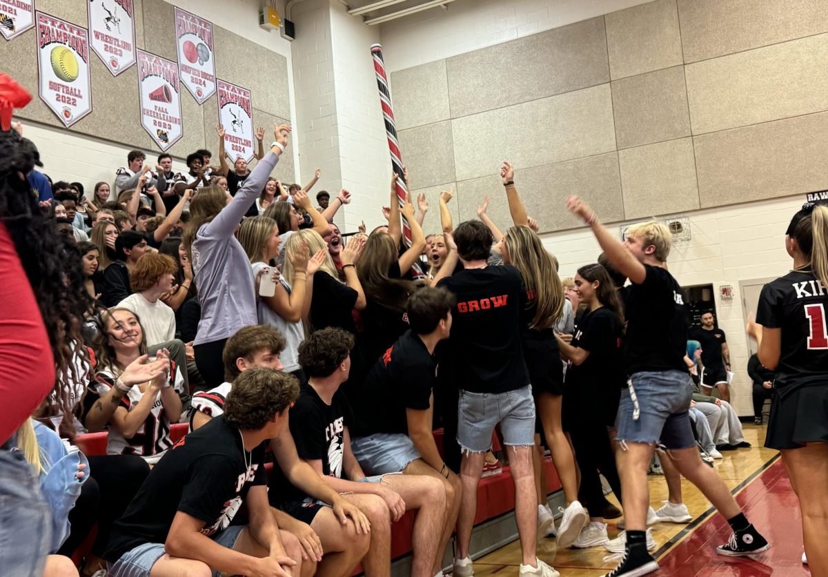 The Class of 2025 celebrates winning the spirit stick after the last spirit day, "Red, Black and Bow Day."