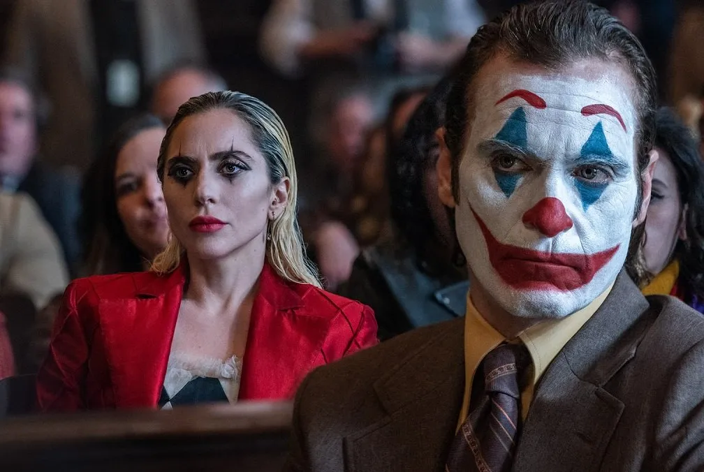 Joaquin Phoenix's Joker (right) and Lady Gaga's Harley Quinn (left) in Joker: Folie à Deux. Warner Bros