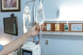 Health care centers across the US work to conserve IV fluids due to short supply. (https://www.pexels.com/photo/person-monitoring-a-dextrose-6129691/ > person monitoring a dextrose by RDNE Stock Project)