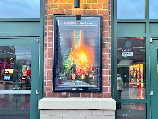 A "Wicked: Part 1" poster is seen outside of Regal Westview Cinemas in Frederick, Md. 