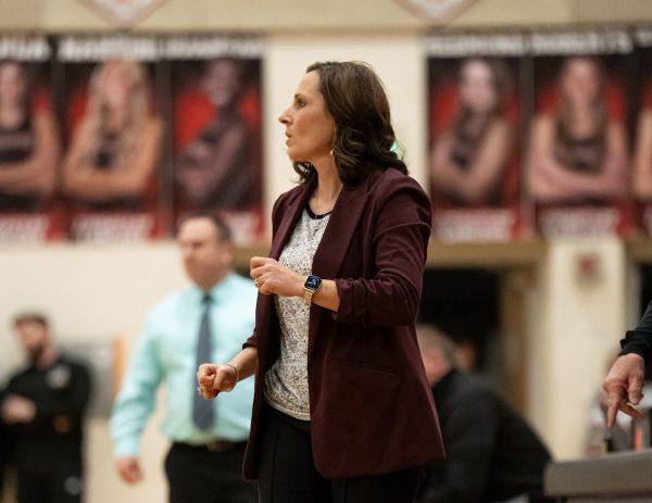 LHS PE teacher Rachael Easterday coaches the girls' varsity basketball team in the game versus Oakdale. (Courtesy of Aubrey Beale -- used with permission)