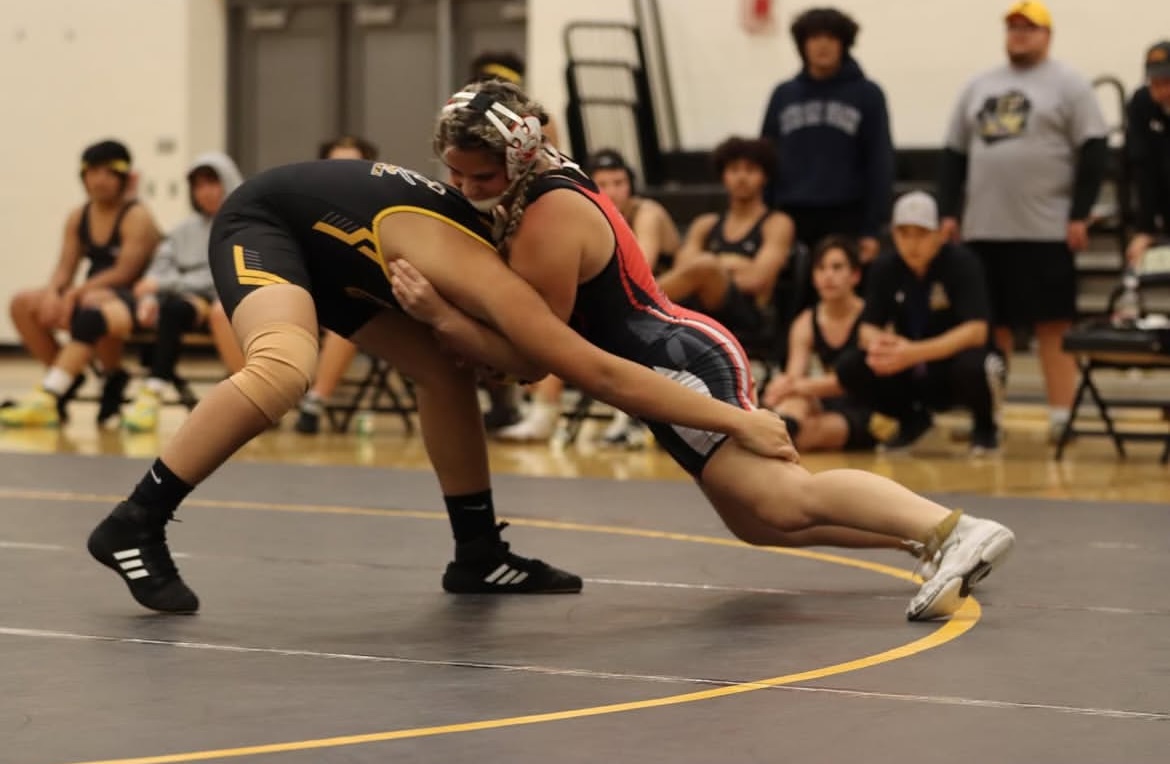 Female wrestler Reagan Leader faces off against a female wrestler at the Frederick High School meet. (Courtesy of Reagan Leader -- used with permission)