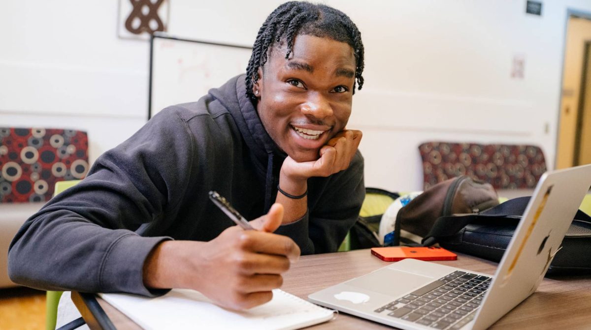 College student working on his schoolwork