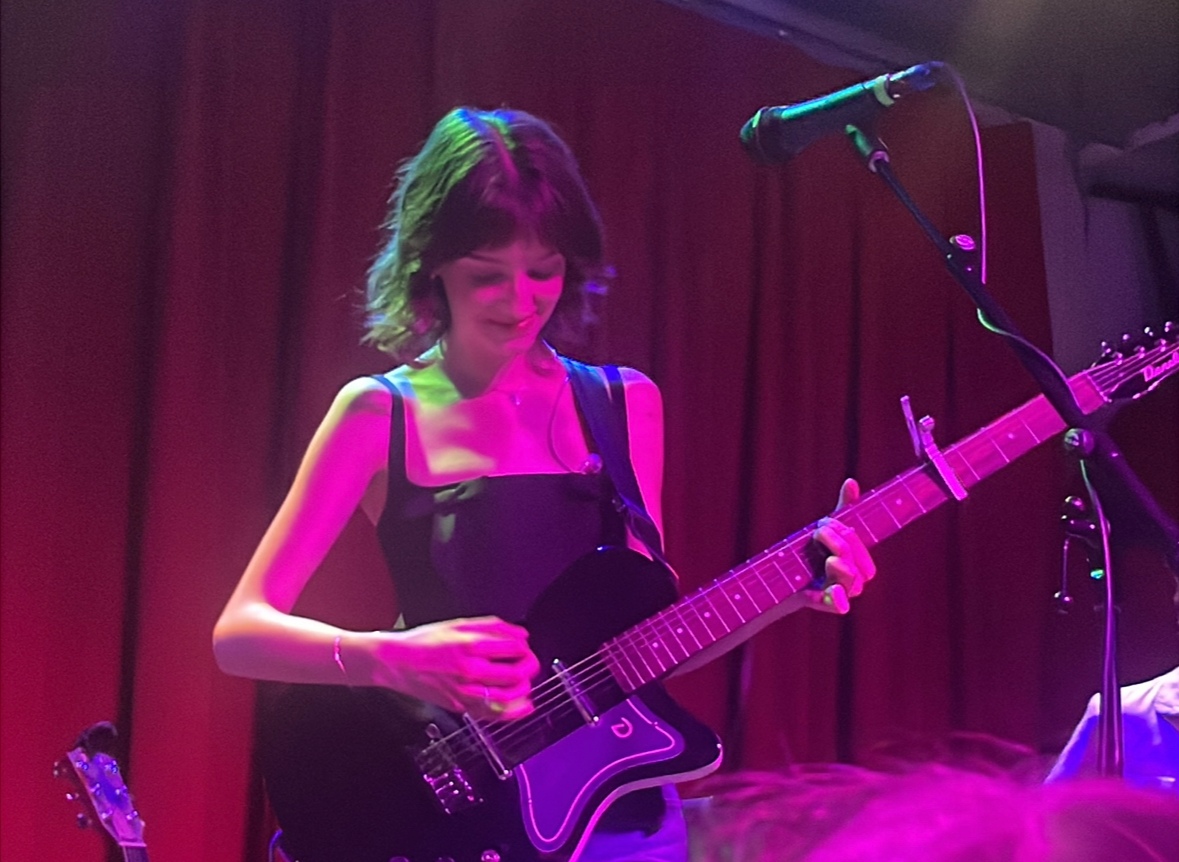 Page plays guitar at The Songbyrd Cafe in Washington.