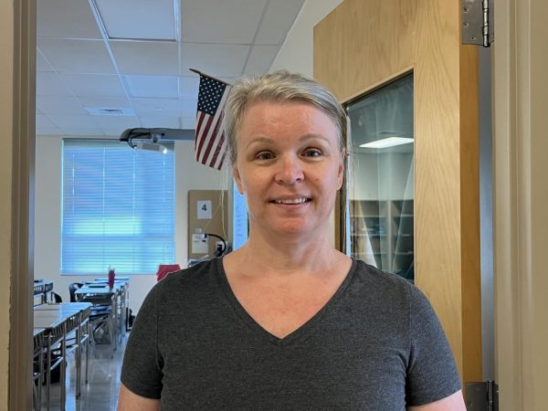 Garcia stands in front of her classroom.