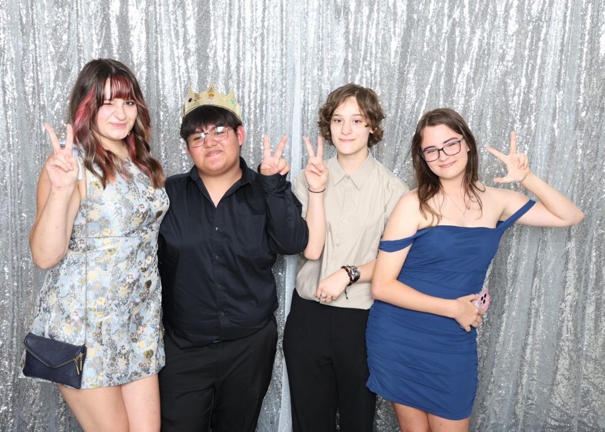 Linganore juniors get ready to pose at pose at the Homecoming dance photo booth.