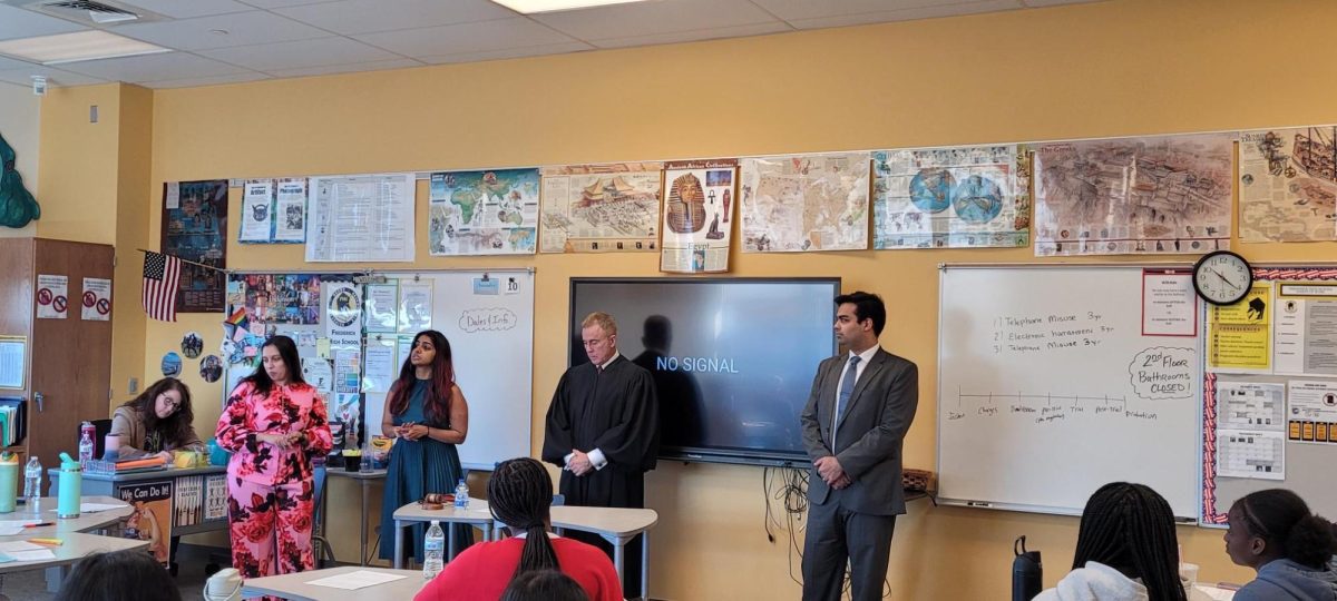 Judge, Rolle, Rachel Reyes (OPD), Meghana Vodela (OPD), Danyel Hannan (SAO), and Sherri Robinson (P&P) as they teach the Order in the Court: A Hands-On Journey Through the Judicial Process class at the Civics and Law Academy. (Used with permission - Phote by Judge Raymond)