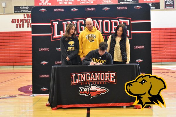 Drew Rupp signs his National Letter of Intent to continue his football career at the University of Maryland, Baltimore County.