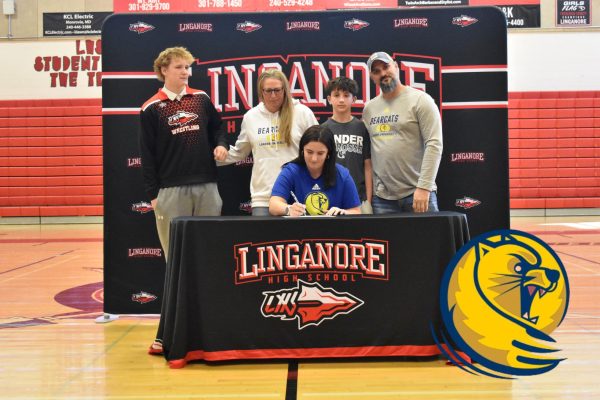 Reagan Leader signs her National Letter of Intent to play lacrosse at Lander University.