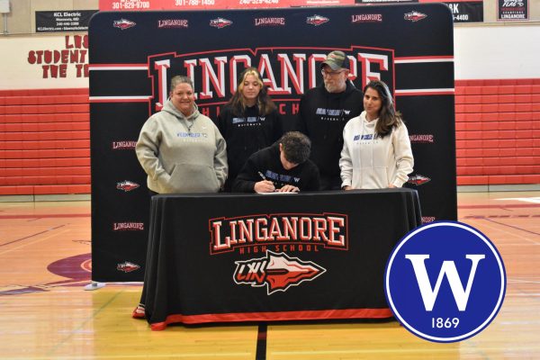 Austin Pizer signing his National Letter of Intent for baseball with Wilson College