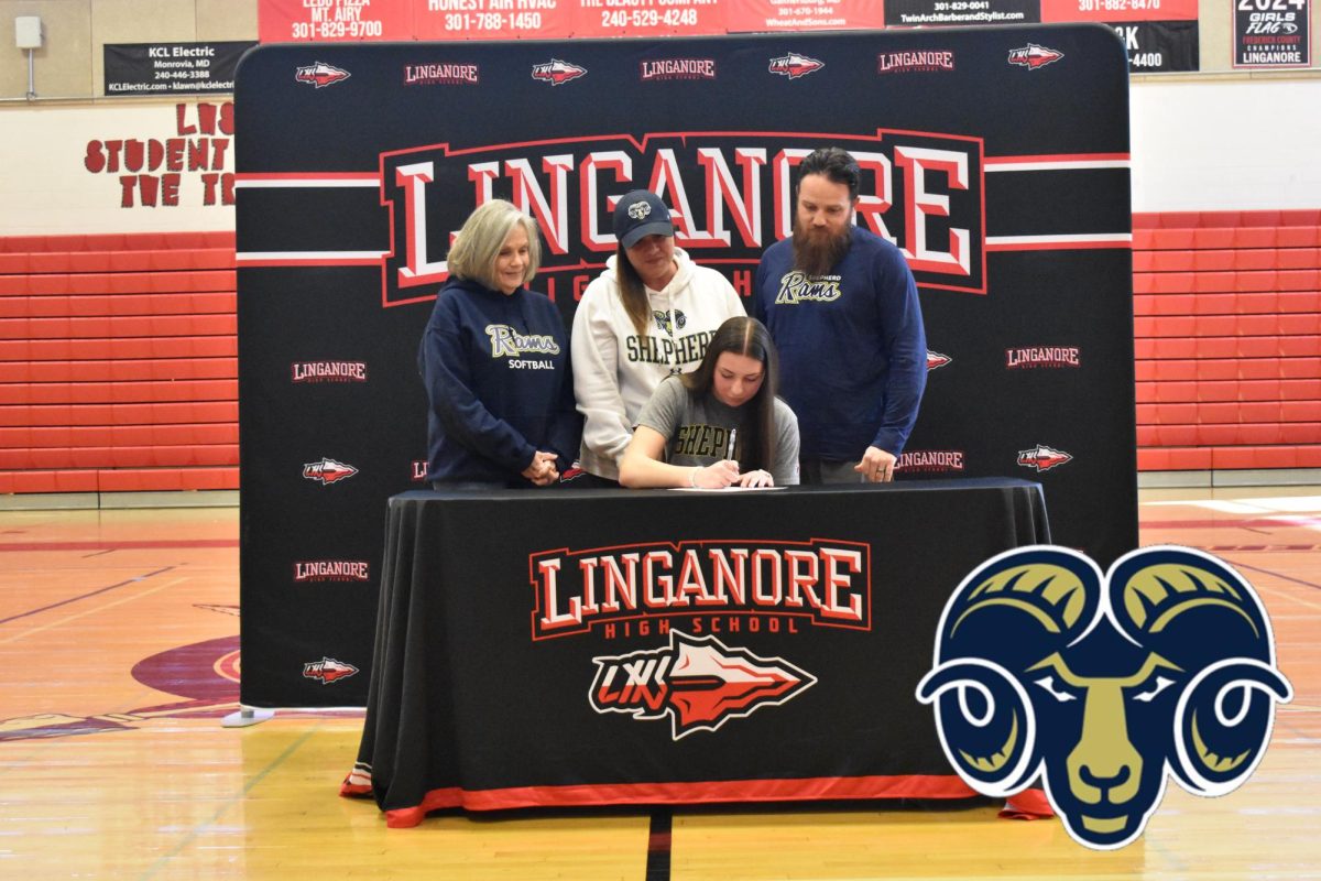 Sydney Mott signs her National Letter of Intent to play softball at Shepherd University