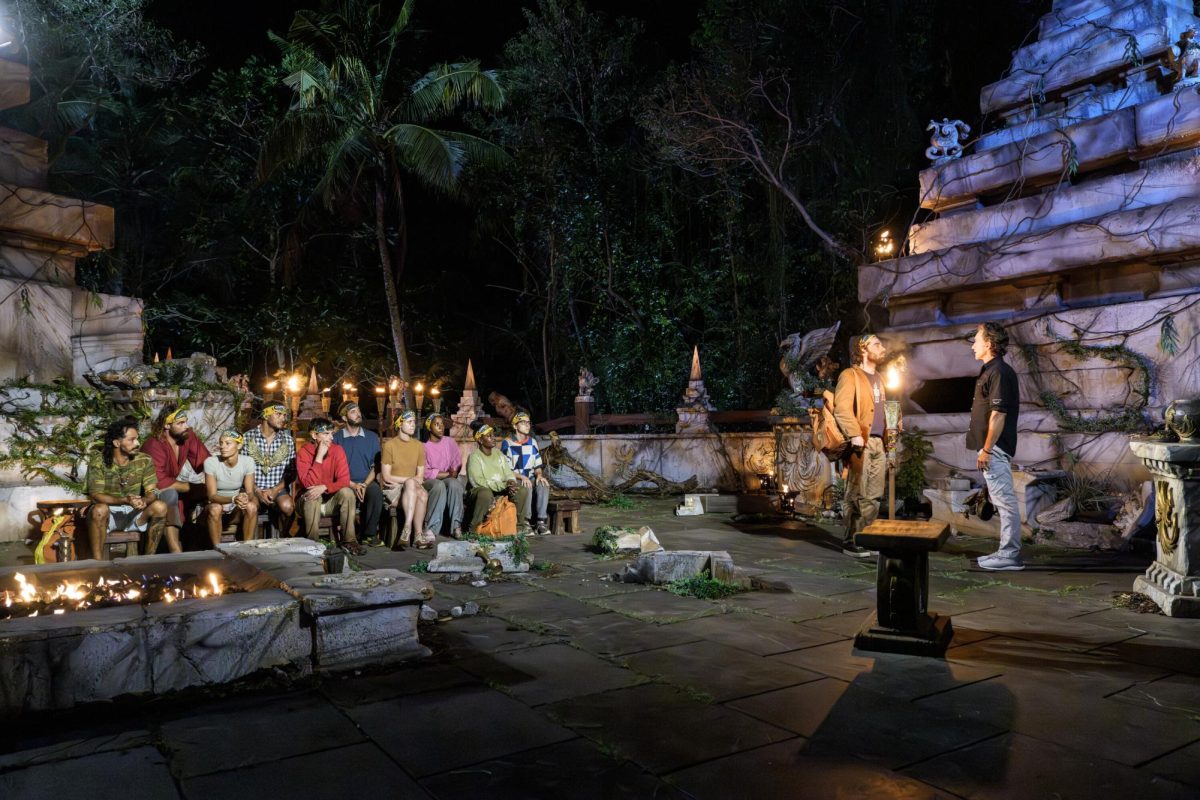 The remaining ten Survivor contestants speak to host, Jeff Probst, at tribal council. (Photo courtesy of CBS Entertainment— used with permission)